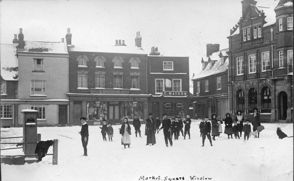 Children in snow on Market Square